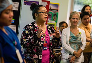 expressive women with people watching