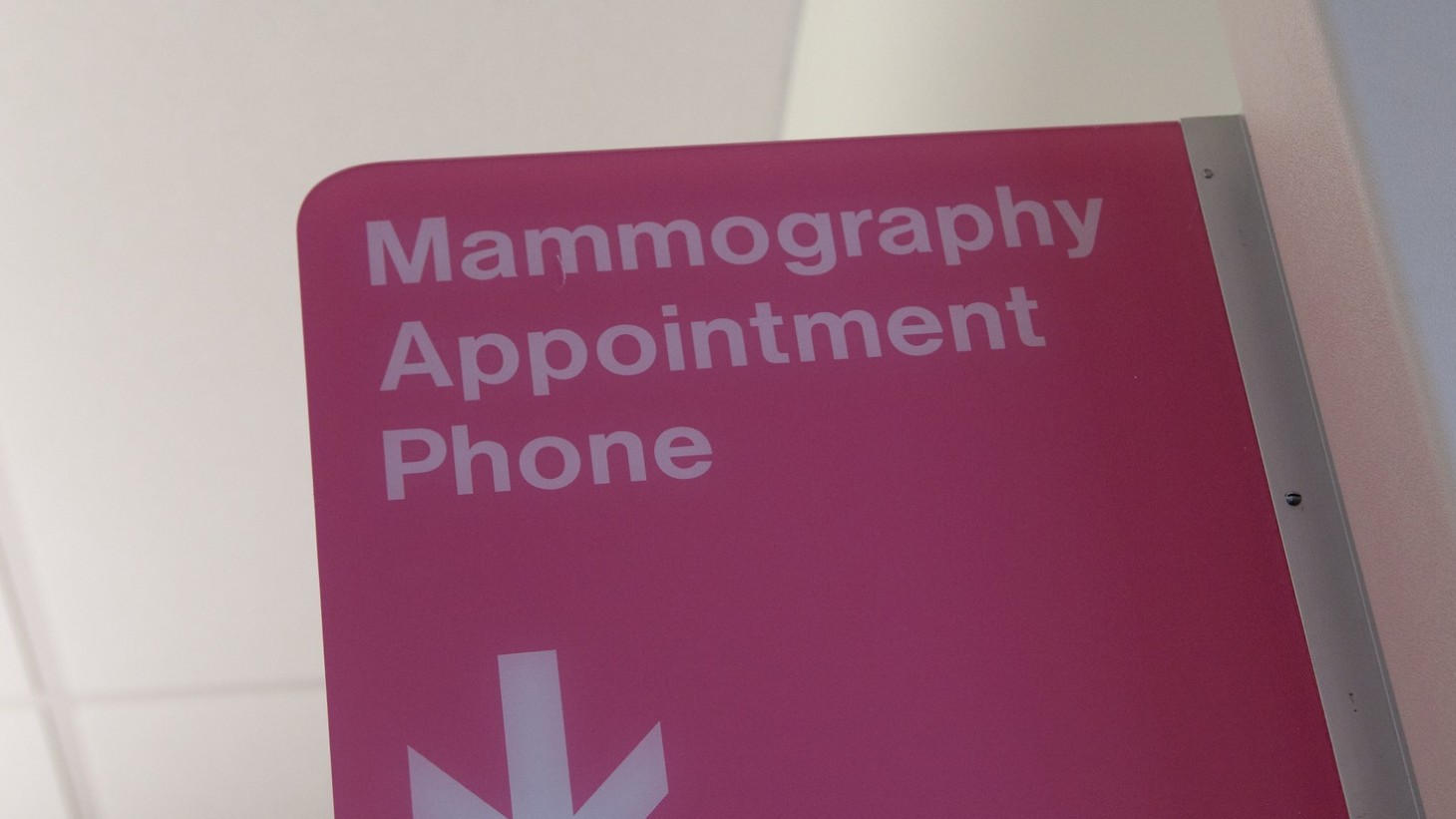 Pink sign that says Mammography Appointment Phone 