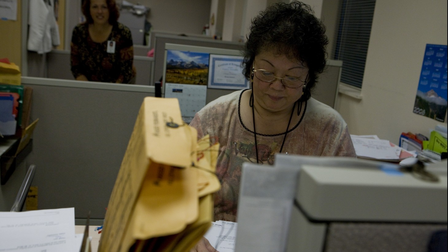 Woman working with documents.