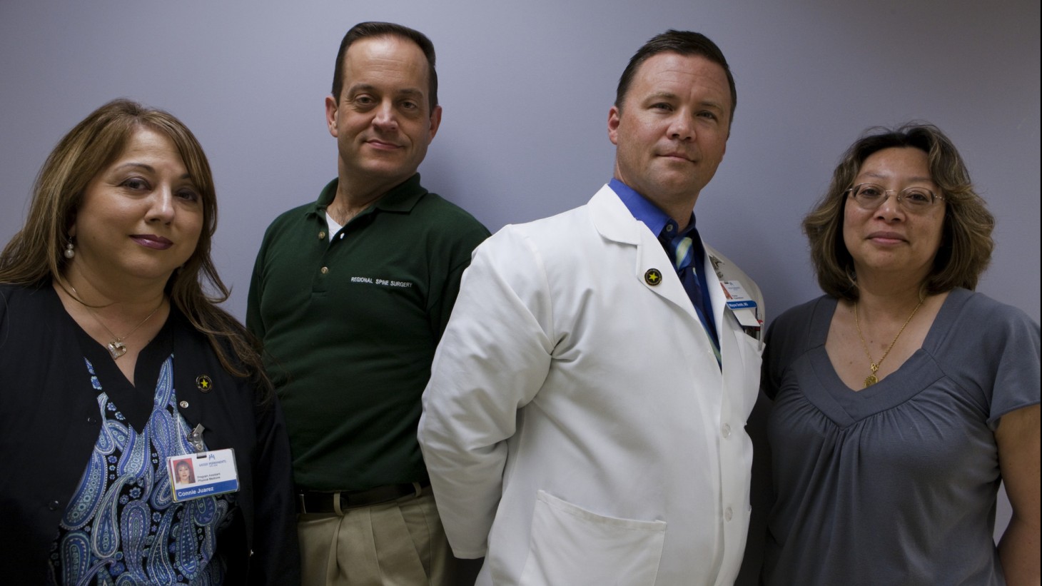 Four health care workers posing together 