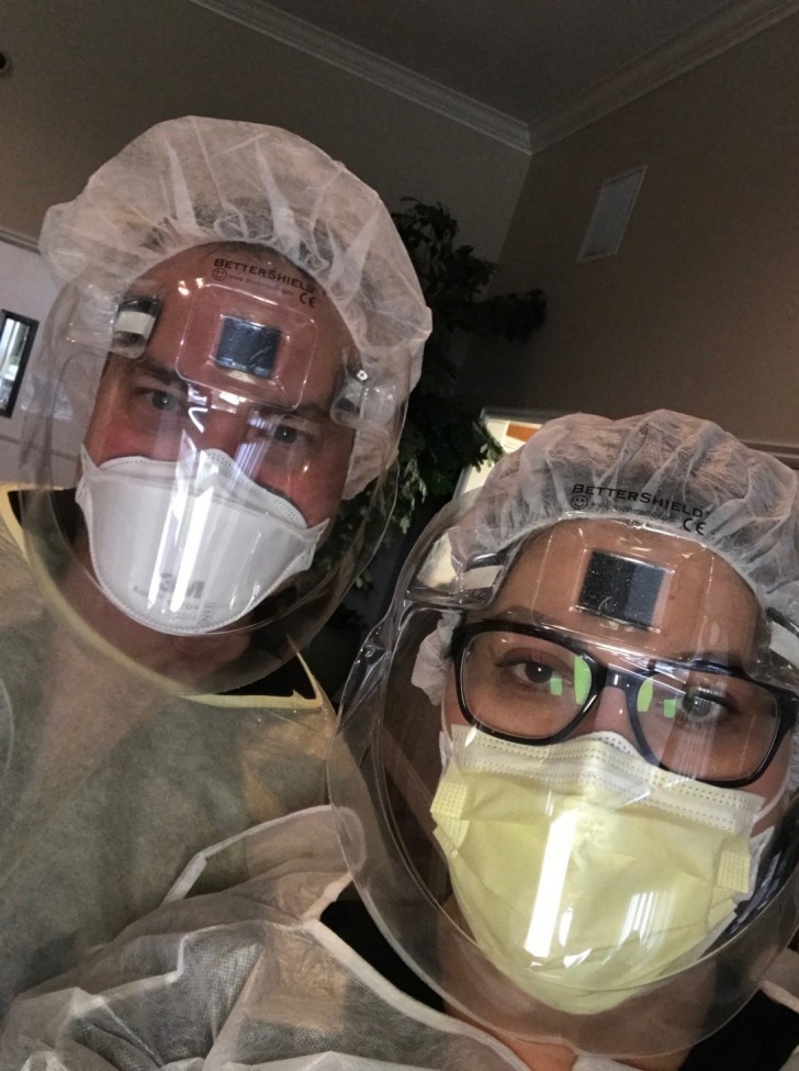 two female health care workers wearing protective gear